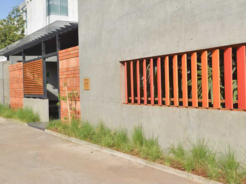 The AA&E studio &mdash; the street wall and its red timber screen