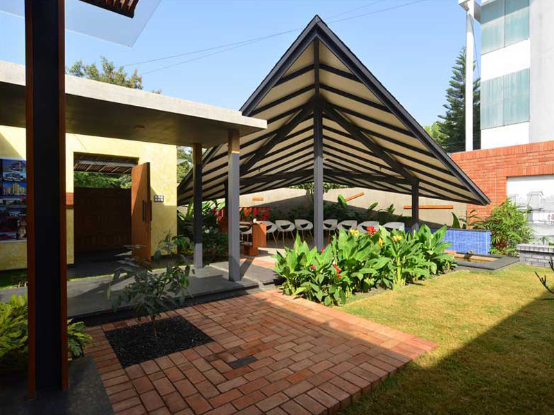 The AA&E studio — the pitched canopy over the garden court