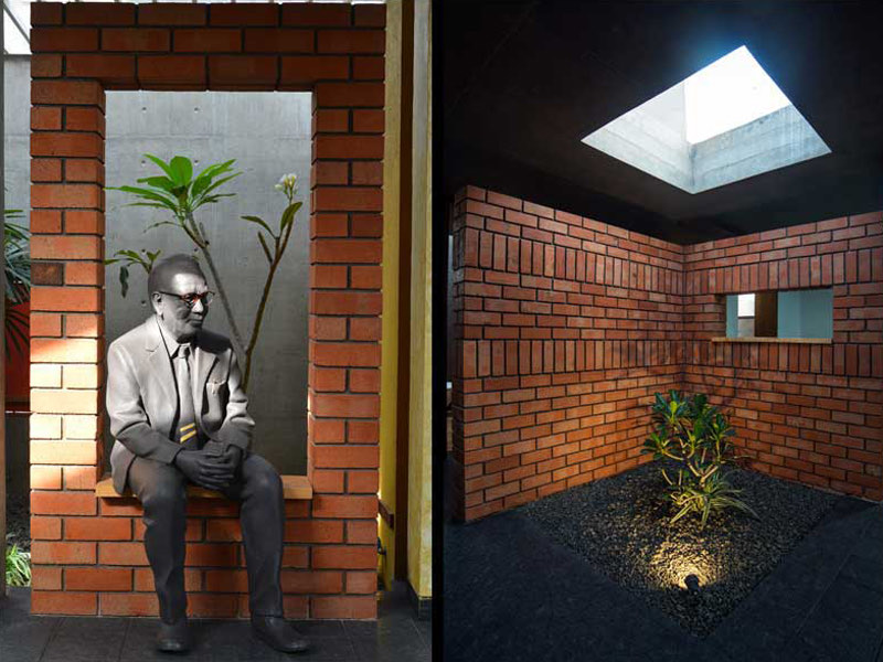 The AA&E studio &mdash; the brick niche with the seated figure, beside the skylit court